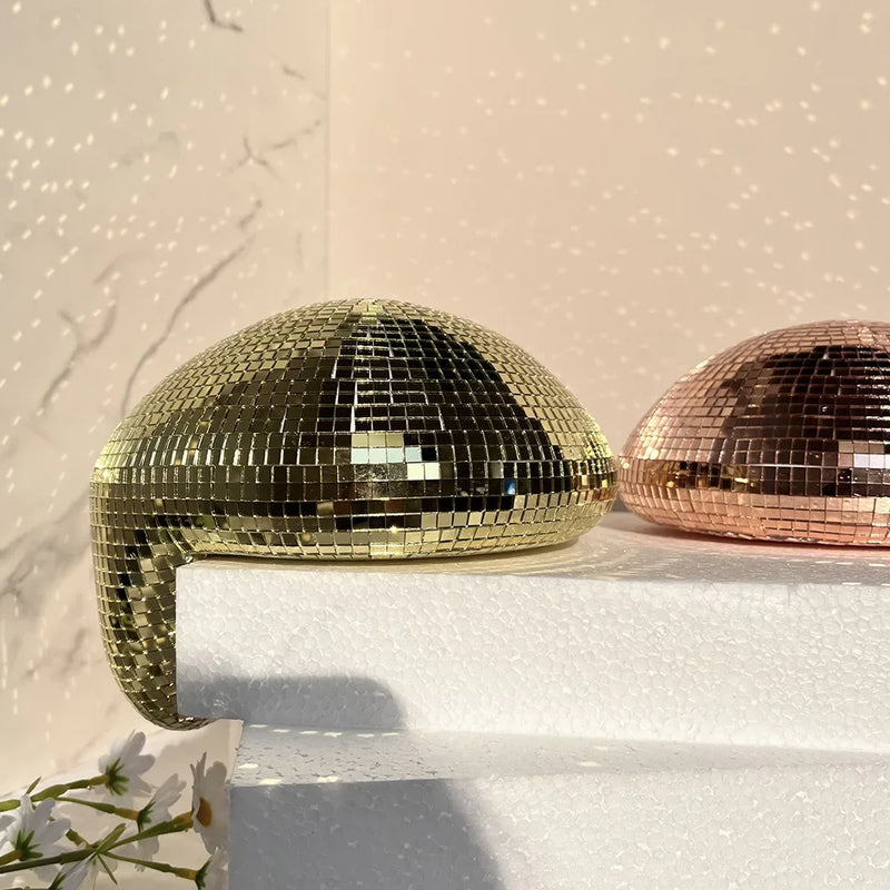 Boule disco fondue – versions dorée et or rose côte à côte