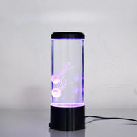 Aquarium méduse lumineux – lampe allumée en violet posée sur une table, avec son câble
