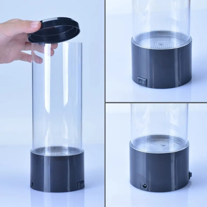 Aquarium méduse lumineux – tube transparent, couvercle retiré, détail du socle, de l'interrupteur et de la prise