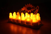 Lot de 12 bougies LED rechargeables multicolores ou ambre, base de charge