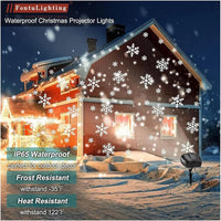 Projecteur de neige de Noël double tête – projecteur IP65 devant une maison enneigée